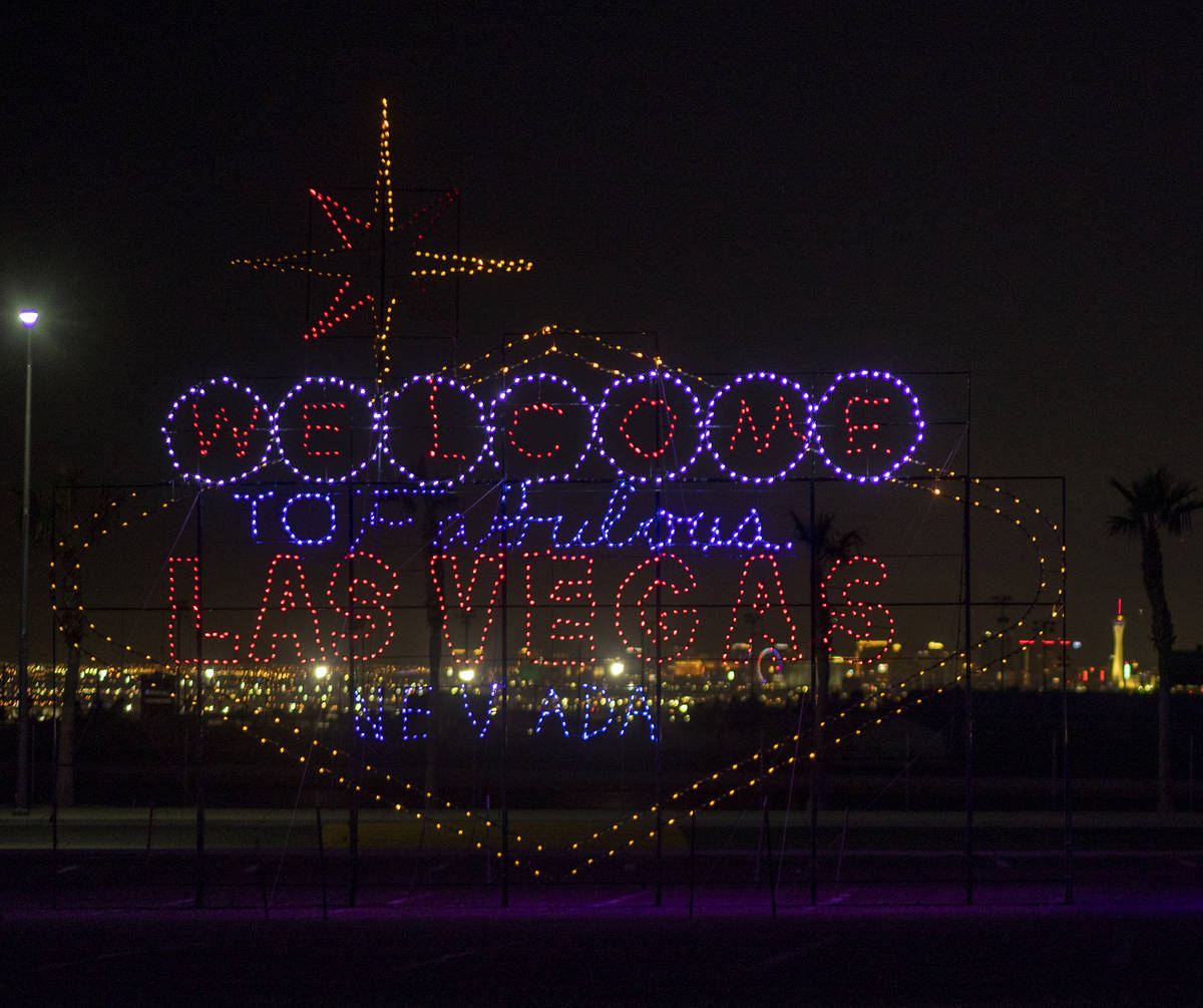 A light display of the Fabulous Las Vegas Sign is seen during a tour of the Glittering Lights a ...
