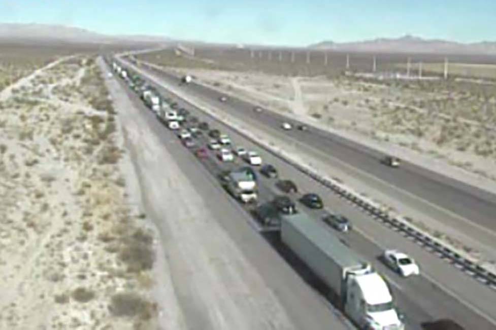 Southbound traffic on Interstate 15 backs up near the Nevada-California border at about 11:40 a ...