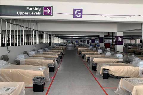 Hospital beds sit inside Renown Regional Medical Center's parking garage, which has been transf ...