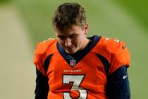 Denver Broncos quarterback Drew Lock (3) looks on as he leaves the field following a win agains ...
