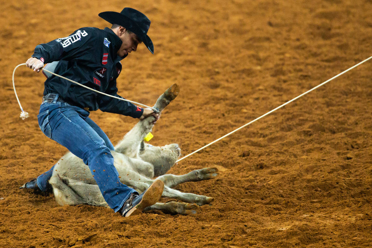 PRCA Tie Down Roping contestant Shad Mayfield earns second place in the first round of his even ...