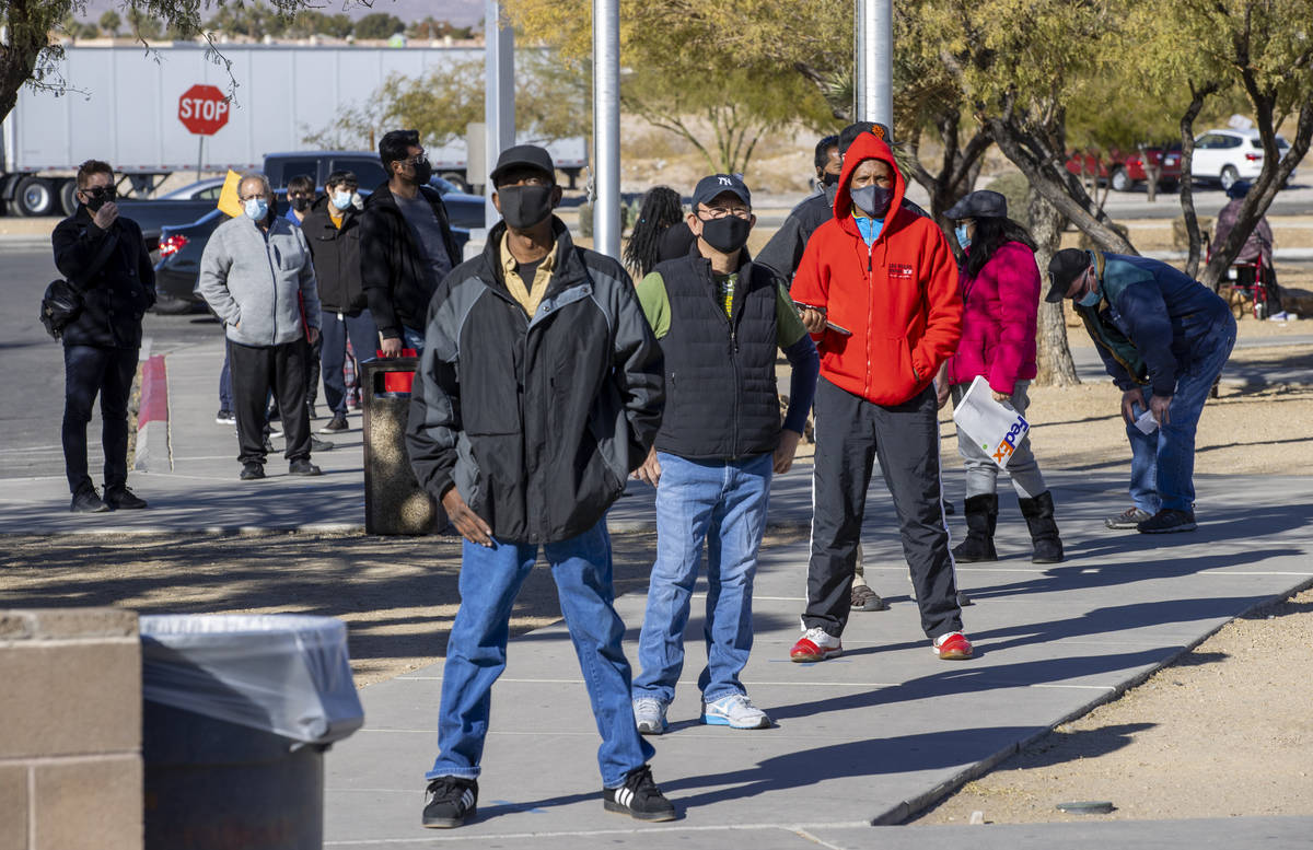 Long lines of people form regularly outside the Nevada Department of Motor Vehicles on West. Fl ...