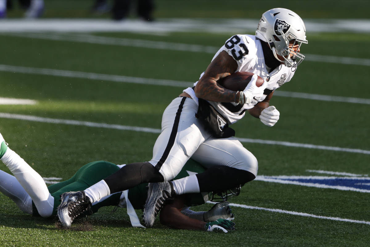 Las Vegas Raiders' Darren Waller runs the ball during the first half an NFL football game again ...