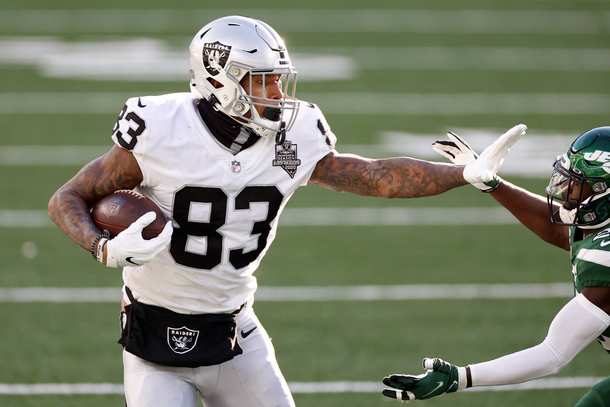 Las Vegas Raiders tight end Darren Waller (83) runs for a touchdown during an NFL football game ...