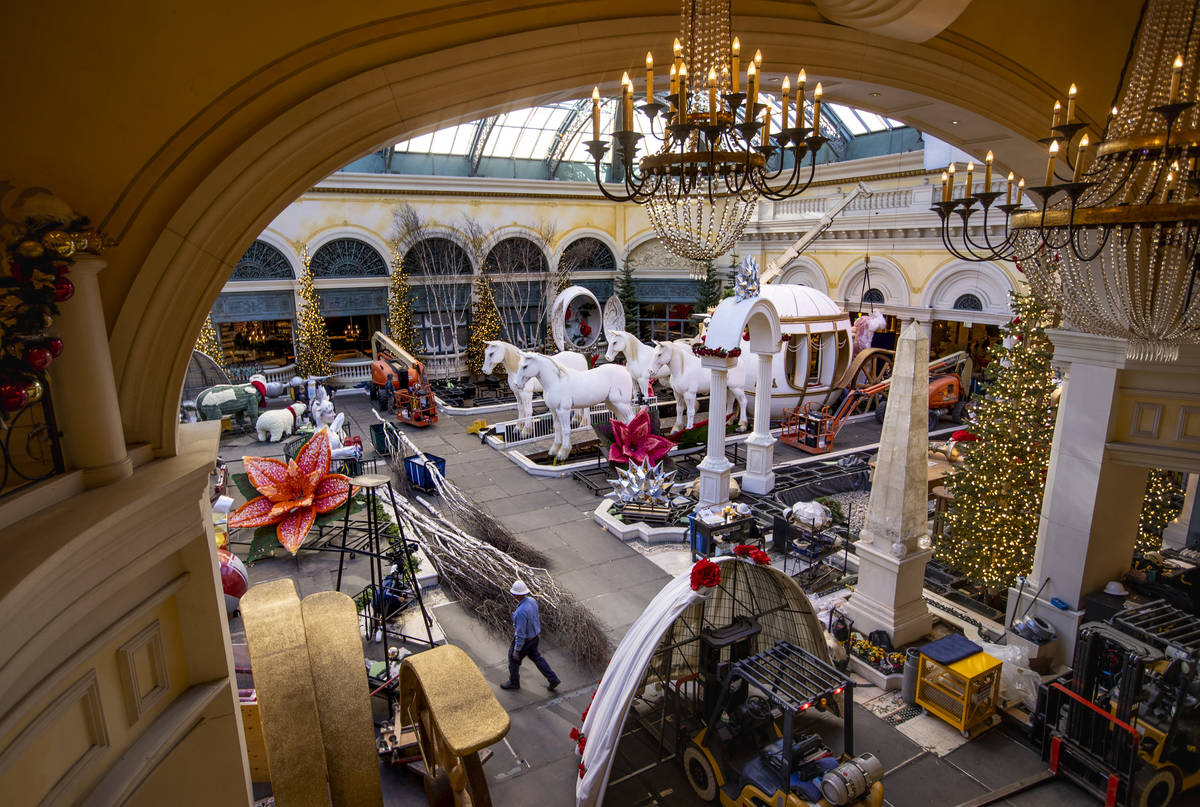 Construction continues about the new winter display "Hopeful Holidays" within the Bellagio Cons ...