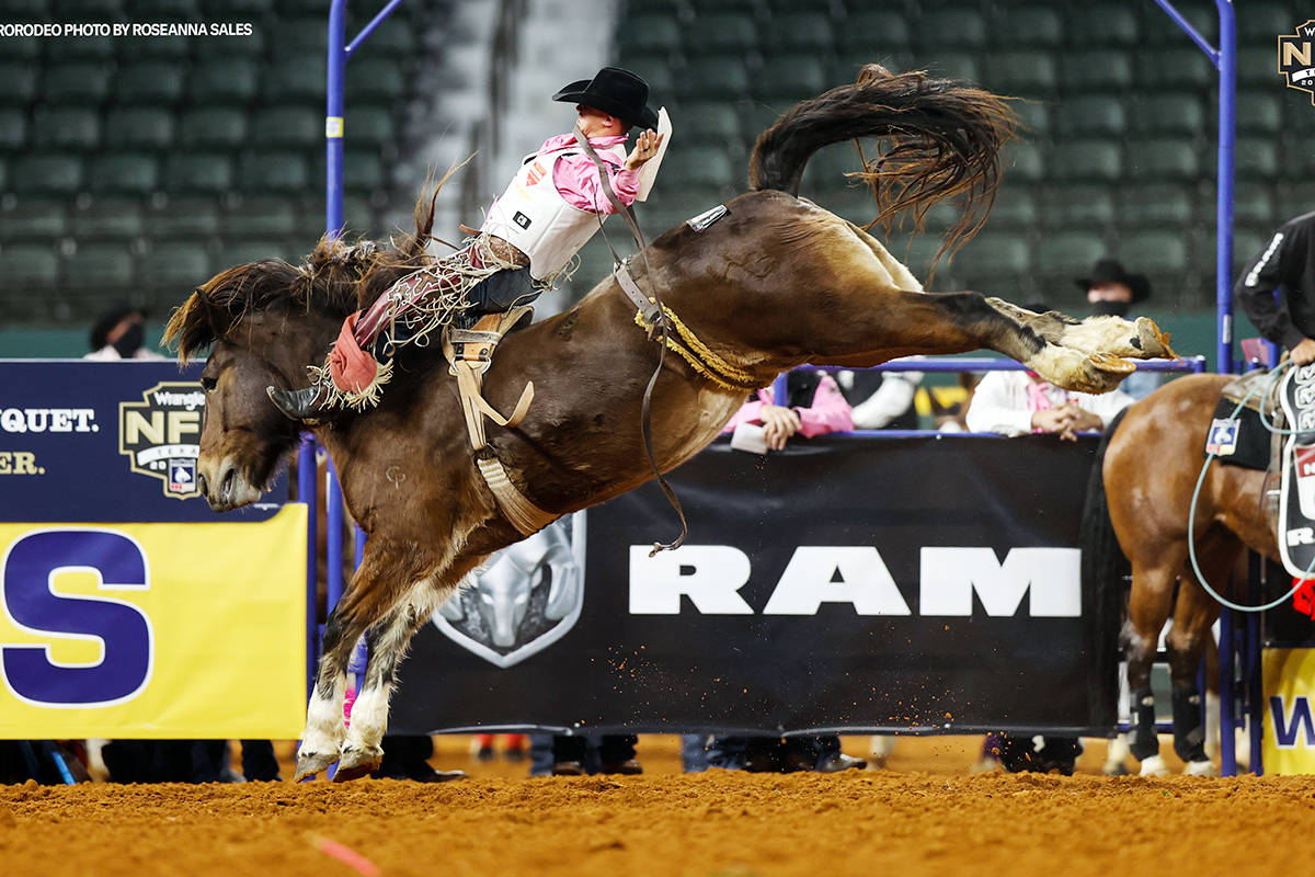 Clayton Biglow performs during the fifth go-round of the National Finals Rodeo in Arlington, Te ...