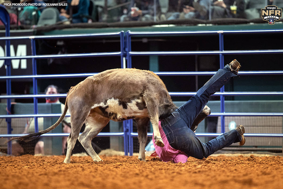 Jacob Talley performs during the fifth go-round of the National Finals Rodeo in Arlington, Texa ...