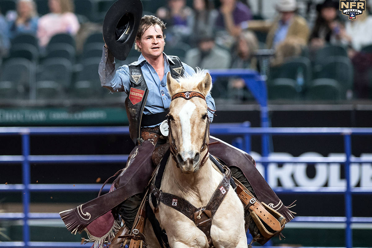 Ty Wallace performs during the fifth go-round of the National Finals Rodeo in Arlington, Texas, ...