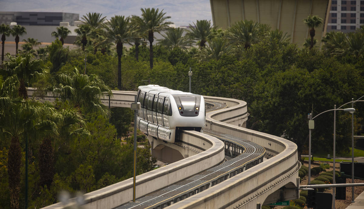 A train makes its way towards the SLS Station along the Las Vegas Monorail system on Sunday, Au ...
