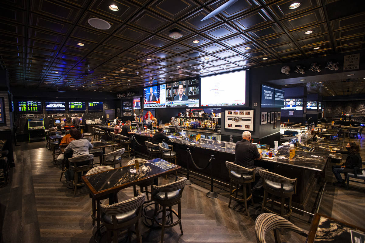 People dine, drink and play bartop gaming machines at the Golden Circle Sportsbook and Bar at T ...