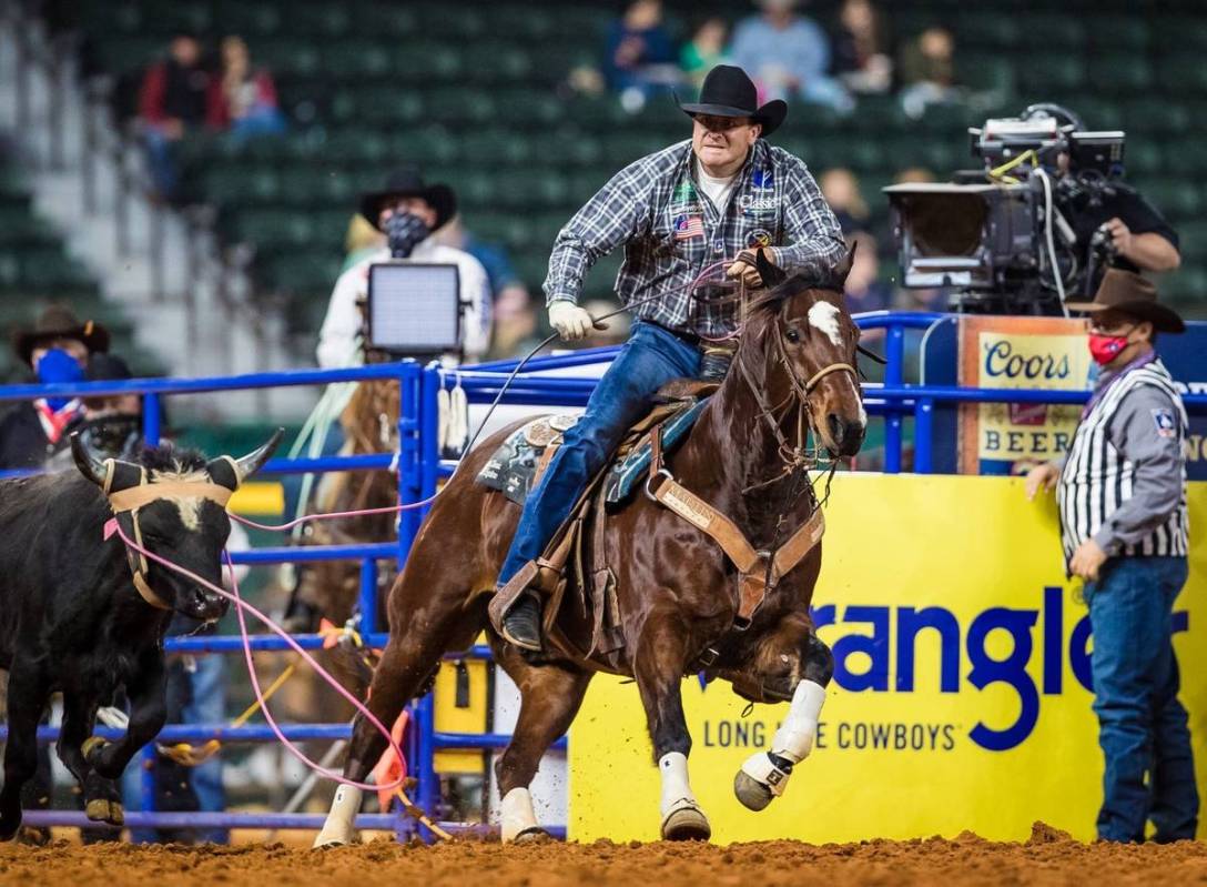 Charly Crawford performs during the 7th go-round of the National Finals Rodeo in Arlington, Tex ...