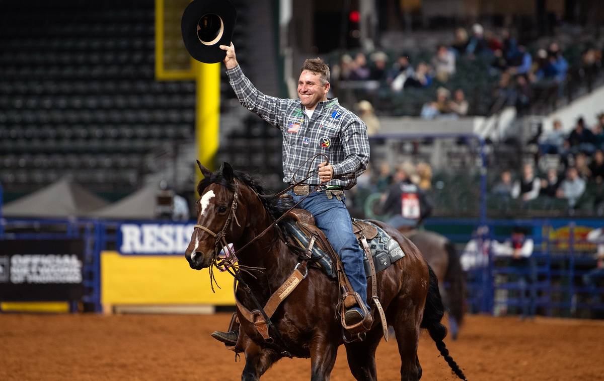 Logan Medlin performs during the 7th go-round of the National Finals Rodeo in Arlington, Texas, ...