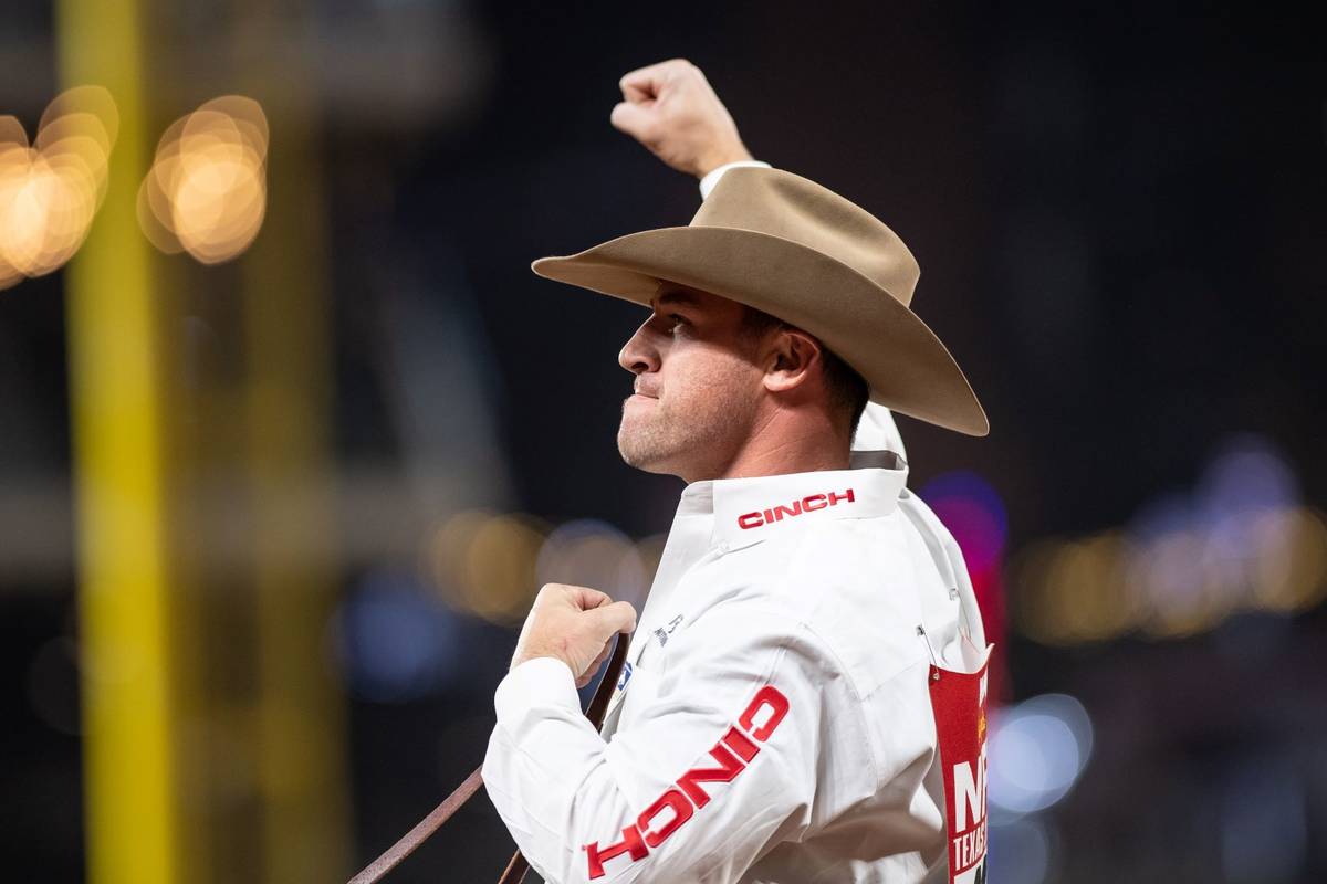 Hunter Herrin performs during the 7th go-round of the National Finals Rodeo in Arlington, Texas ...