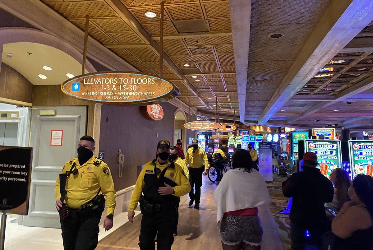 Las Vegas police leave Treasure Island on the casino floor after investigating reports of a gun ...