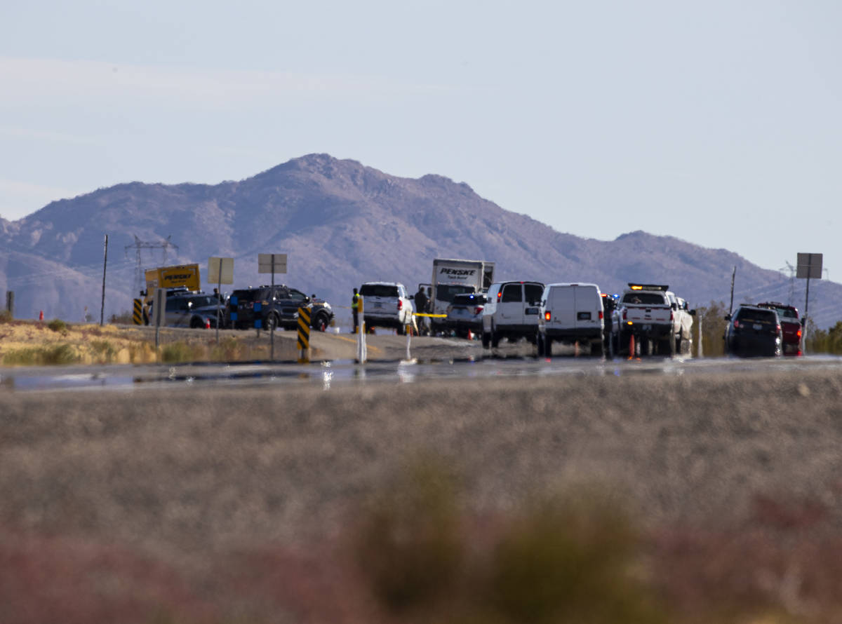 Nevada Highway Patrol troopers respond to the scene of a crash that left five bicyclists dead o ...