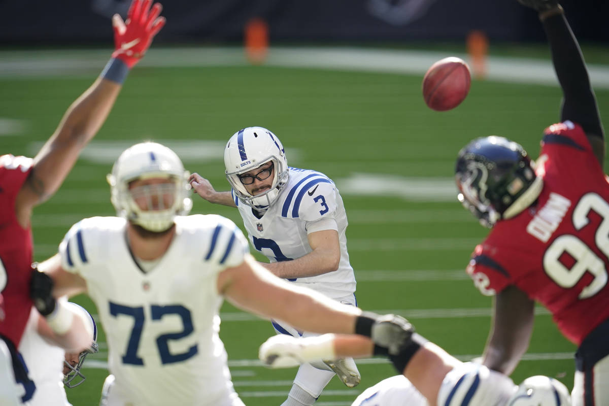 Indianapolis Colts kicker Rodrigo Blankenship (3) kicks an extra point during an NFL football g ...