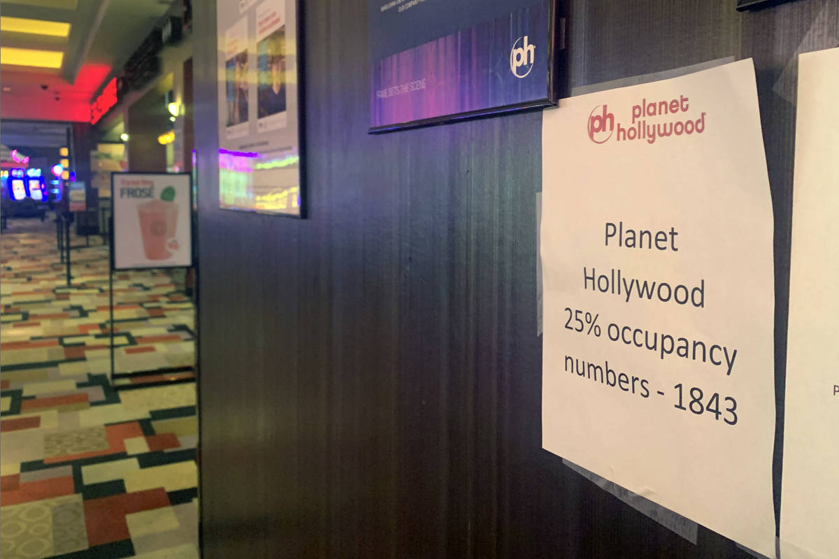 A 25 percent occupancy sign is posted at an entrance of Planet Hollywood on the Las Vegas Strip ...