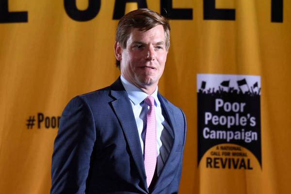 Rep. Eric Swalwell, D-Calif., speaks at the Poor People's Moral Action Congress presidential fo ...