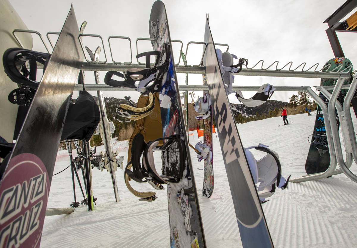 A skier makes their way down the run during opening day of skiing and snowboarding at Lee Canyo ...