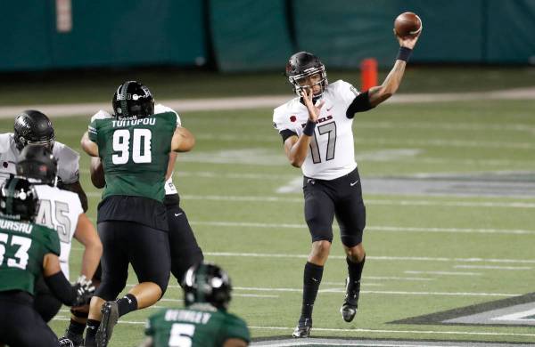 UNLV quarterback Doug Brumfield (17) throws a pass against Hawaii during the first half of an N ...