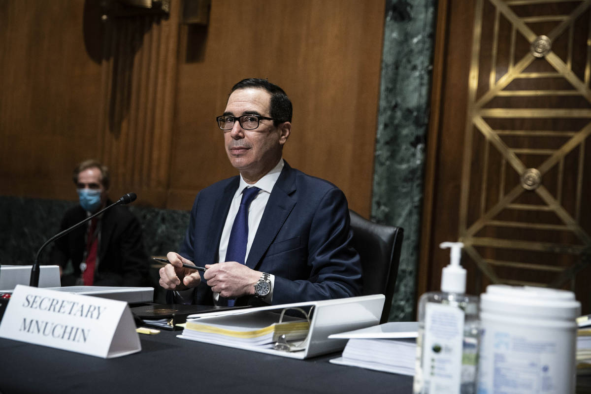 Treasury Secretary Steven Mnuchin arrives to testify at a Congressional Oversight Commission he ...