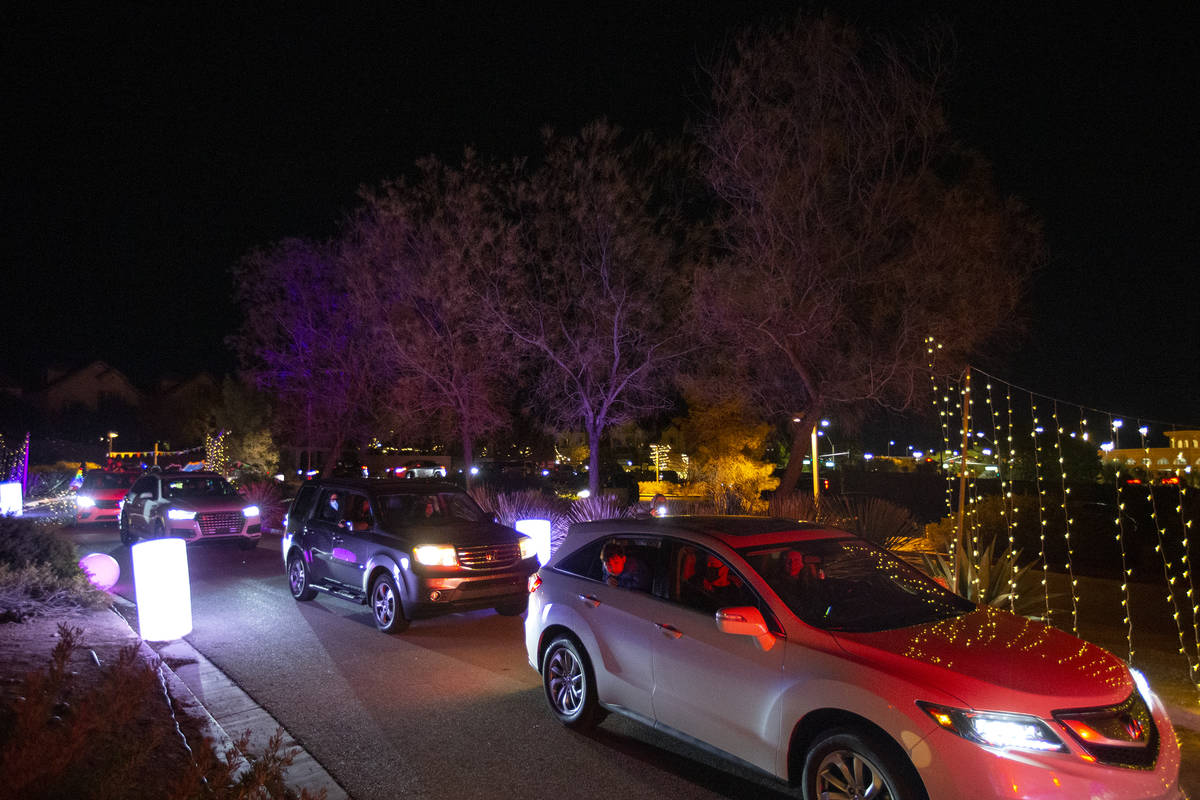 Vehicles pass through a Hanukkah event hosted by the Israeli American Council Center on Saturda ...