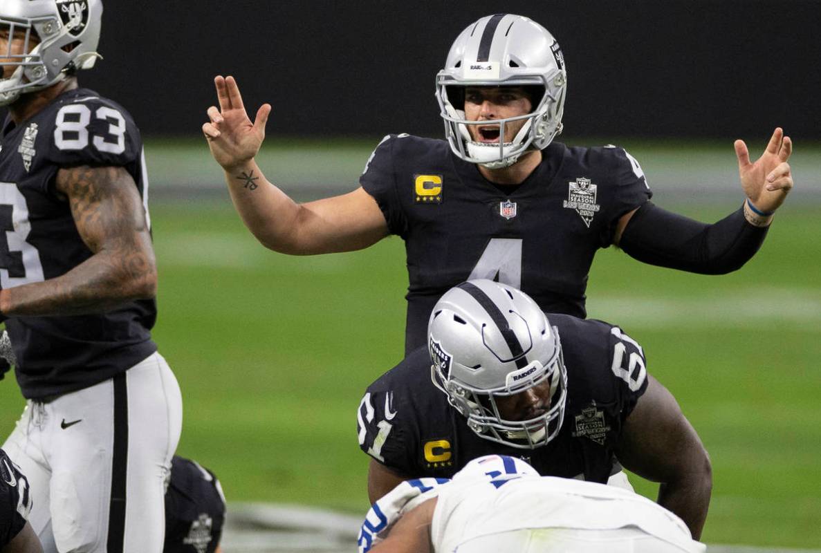 Raiders quarterback Derek Carr (4) calls an audible in the third quarter during an NFL football ...