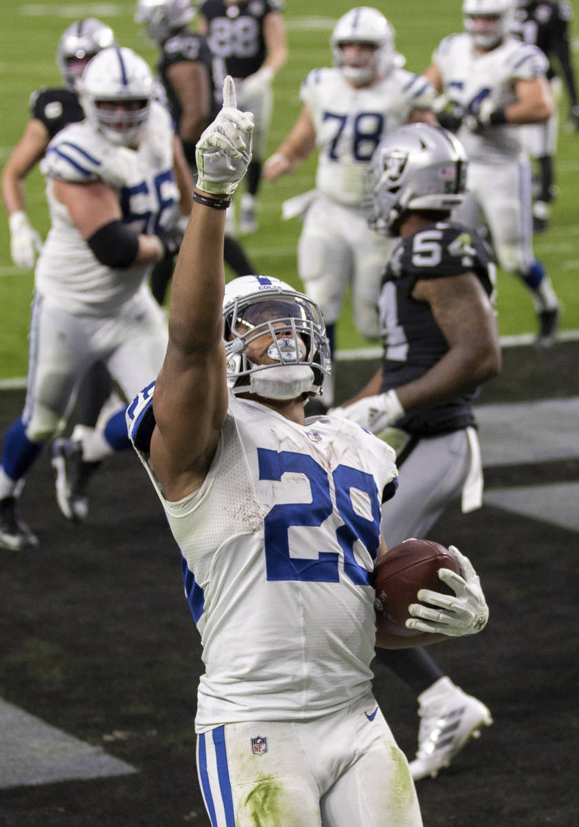 Indianapolis Colts running back Jonathan Taylor (28) celebrates after rushing for a fourth quar ...