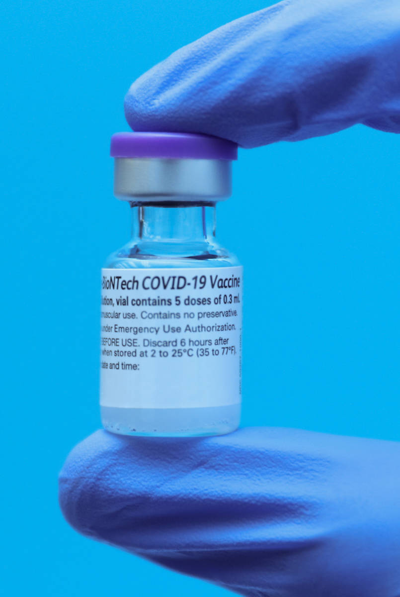 A University Medical Center Employee shows off the COVID-19 vaccine on Monday, Dec. 14, 2020 at ...