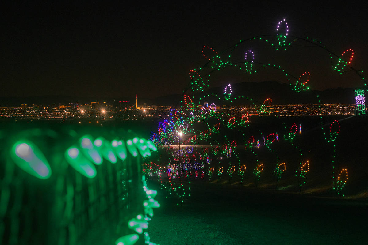 Cars tour through Glittering Lights at Las Vegas Motor Speedway in Las Vegas on Monday Nov. 30, ...