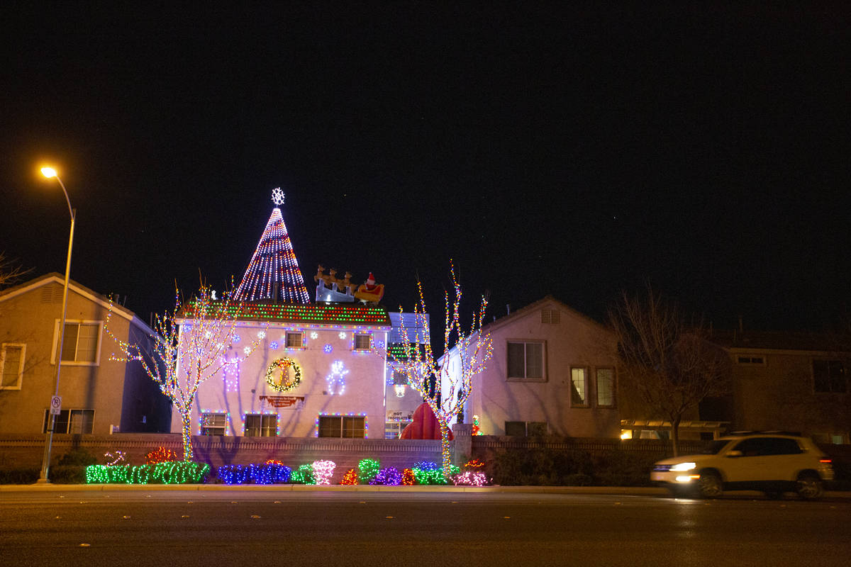 Jeff and Karol Doody's light display wraps around the whole house facing South Jones Boulevard ...