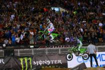 Adam Cianciarulo (9) leads the race past Eli Tomac (1) during the third main event of the Monst ...