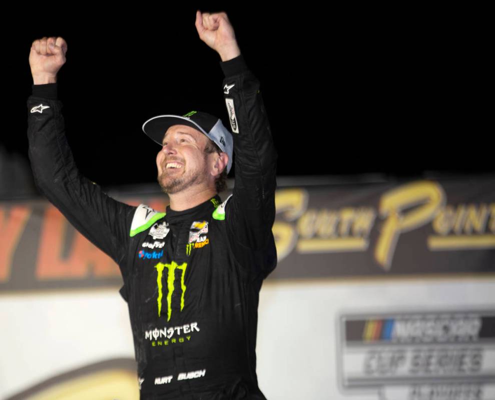 Kurt Busch (1), of Las Vegas, celebrates in Victory Lane after a NASCAR Cup Series auto ra ...