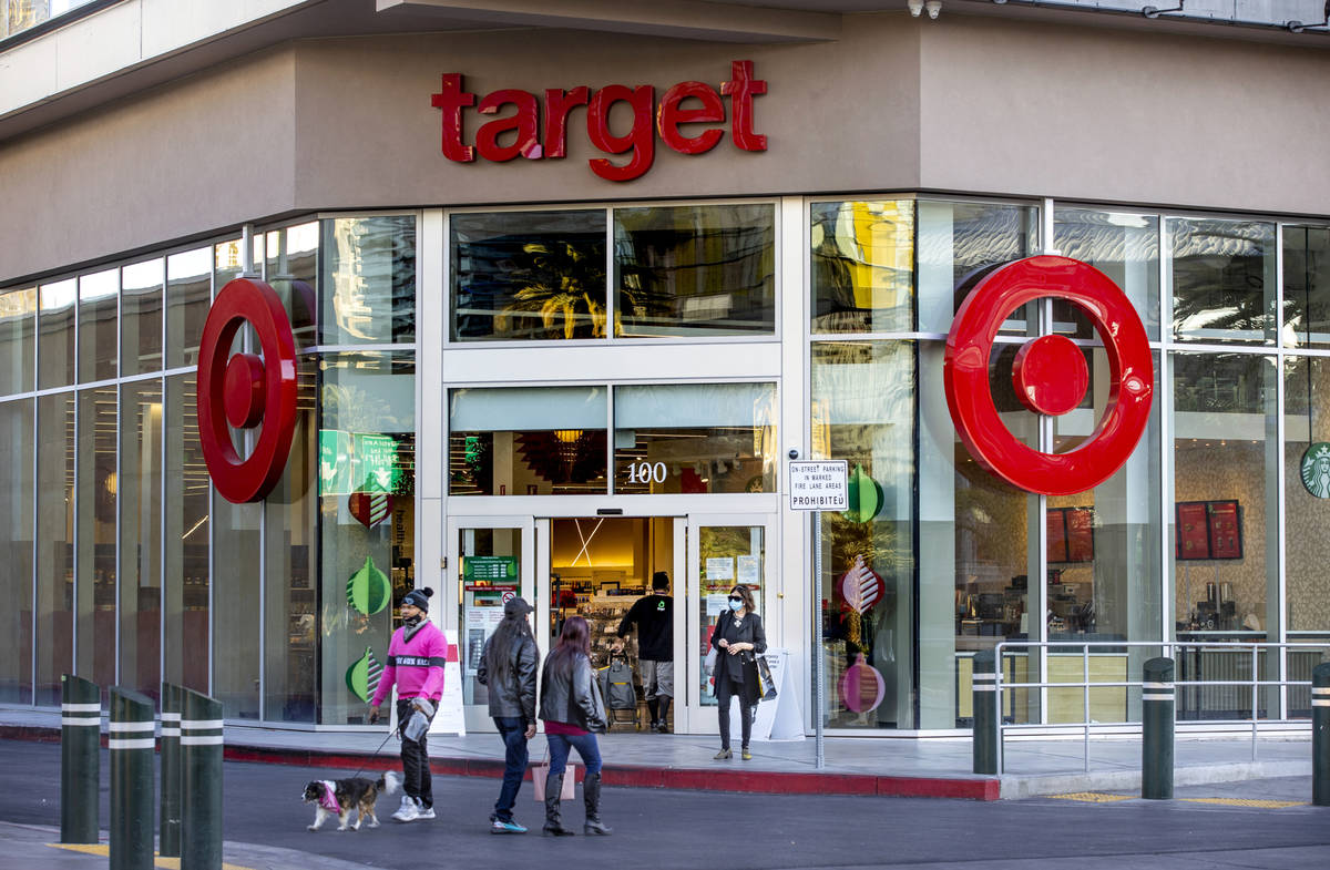 Pedestrians walk by a Target store in the Showcase Mall building where Olive Garden plans to op ...