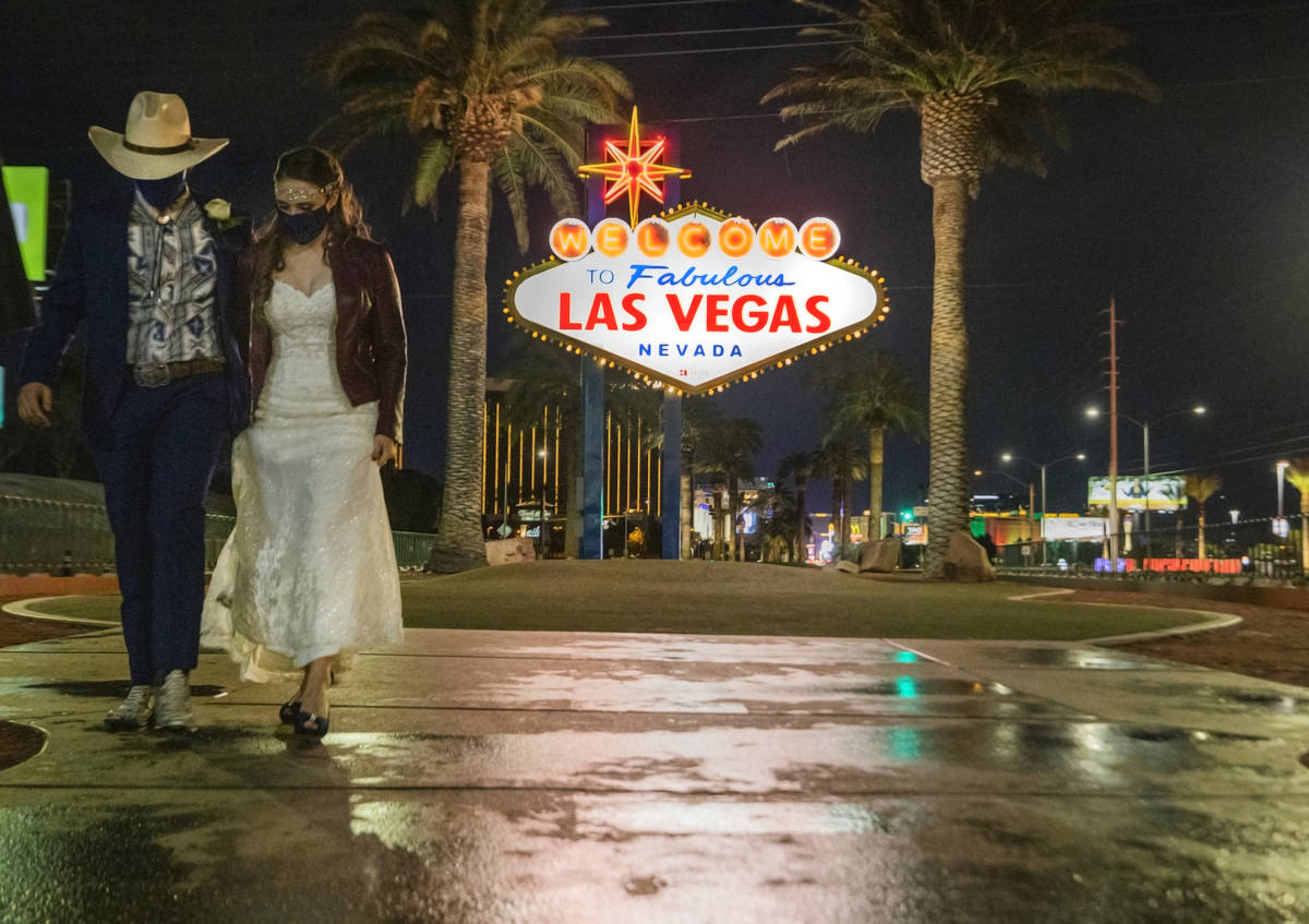 Newlyweds Jonathan Figueroa, 25, left, and Catherine Gibbs, 32, of Temperance Mich., are seen n ...