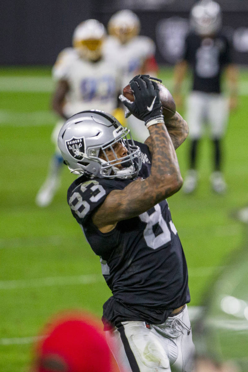 Raiders tight end Darren Waller (83) makes a catch during the fourth quarter of an NFL football ...