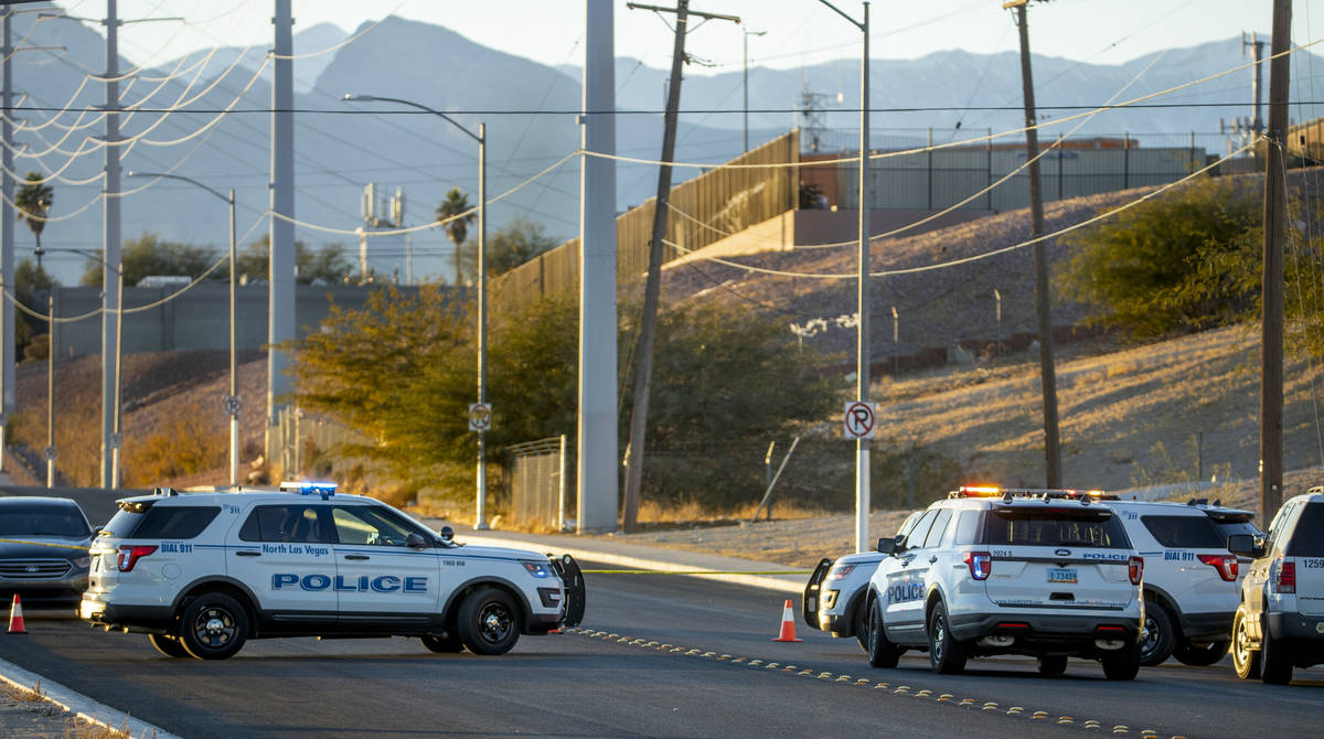 North Las Vegas Police investigate a homicide along West Brooks Avenue near Revere Street on Fr ...