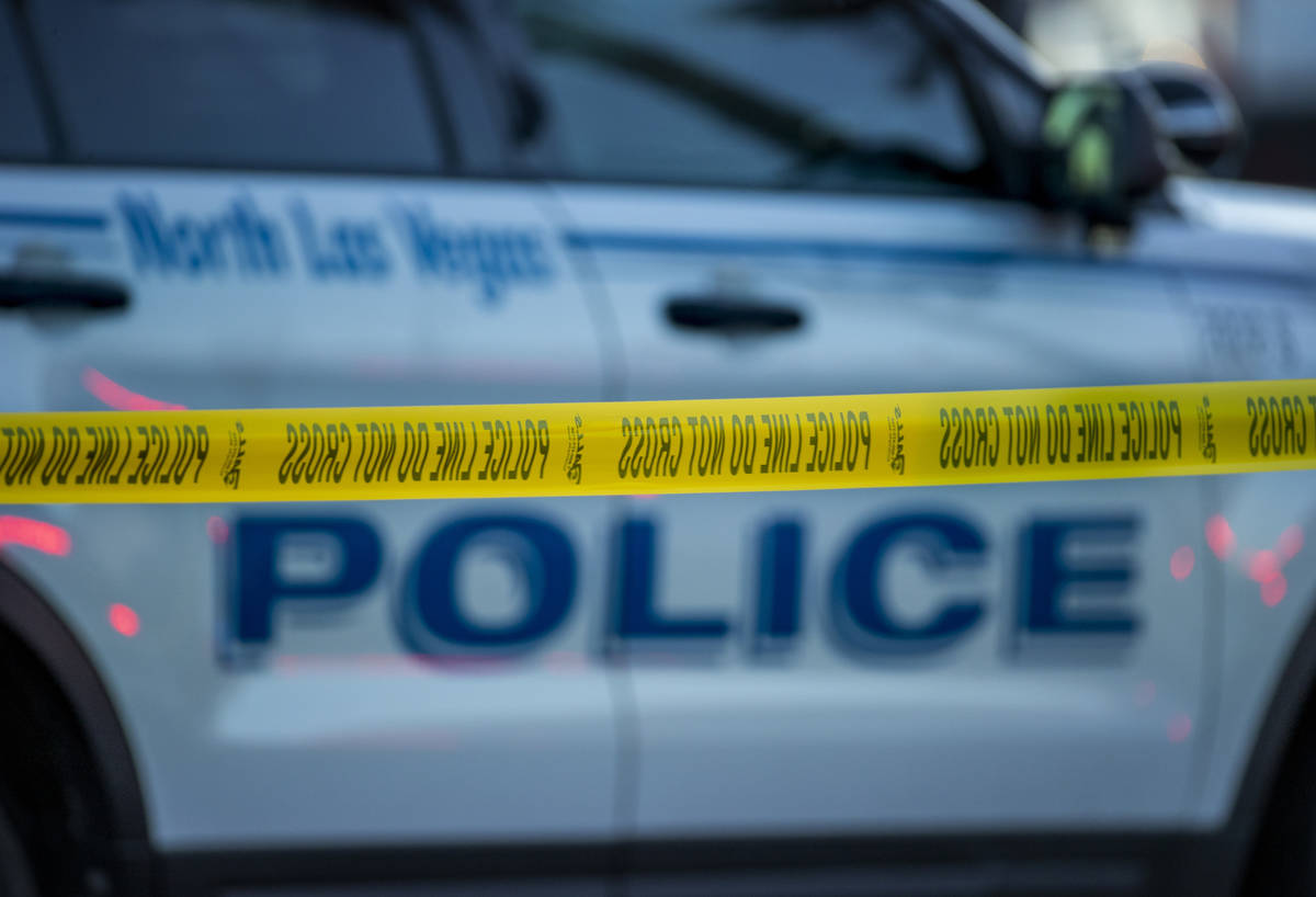 North Las Vegas Police investigate a homicide along West Brooks Avenue near Revere Street on Fr ...