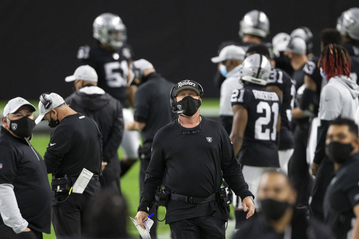 Raiders Head Coach Jon Gruden looks up at the score board in the second quarter during an NFL f ...