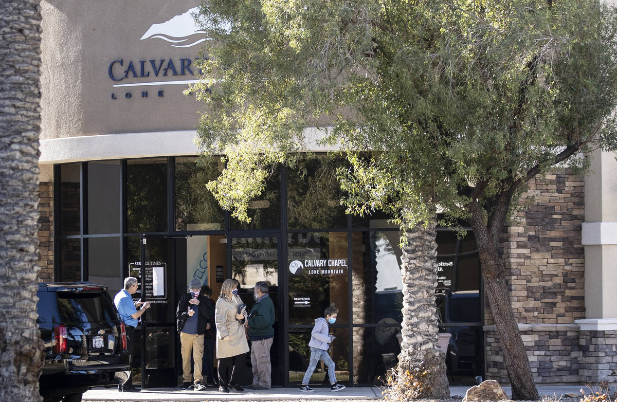 Church members exit Calvary Chapel Lone Mountain after the 9 a.m. service on Sunday, Dec. 20, 2 ...