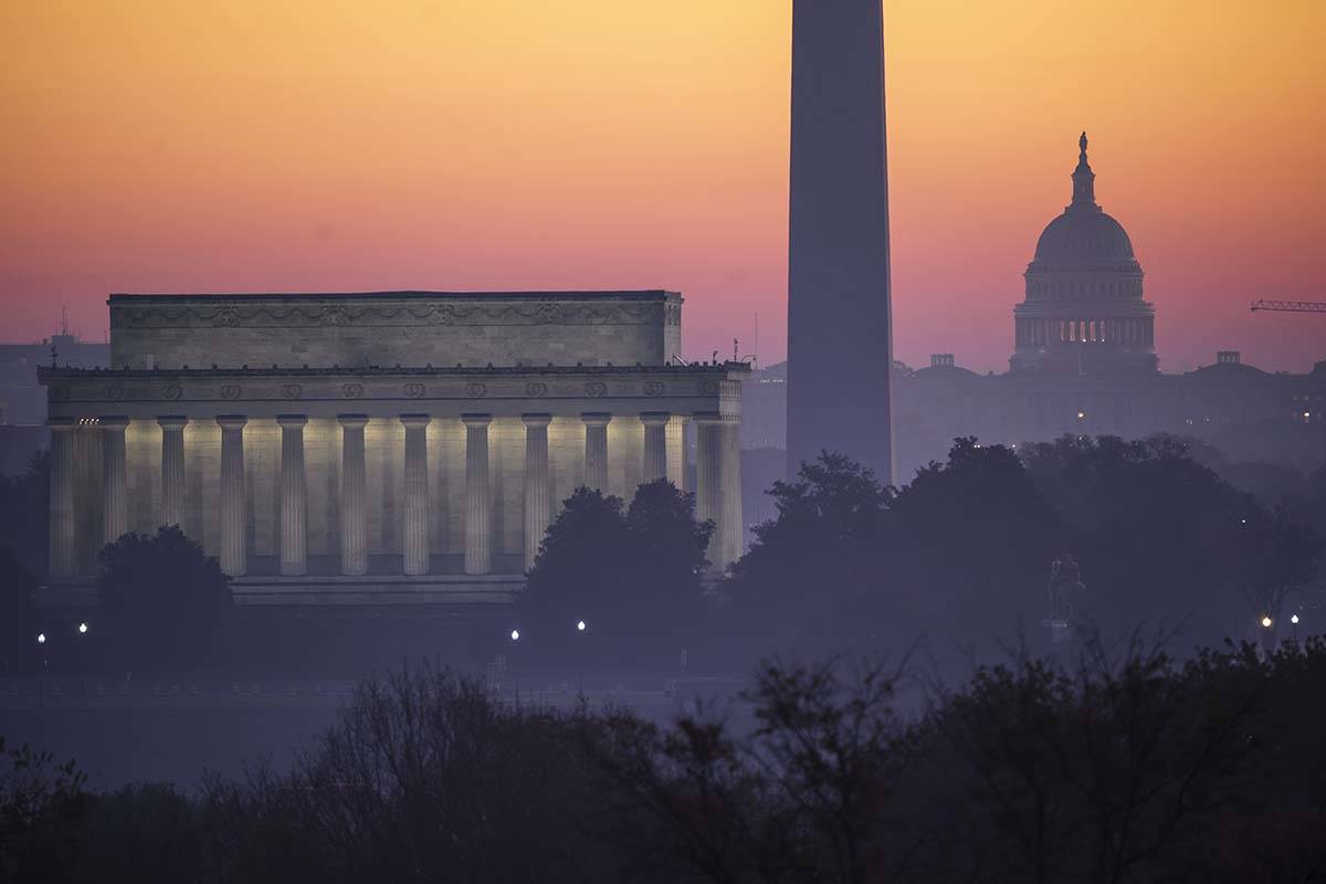 In this Nov. 8, 2020, file photo, the Washington skyline is seen at dawn with from left the Lin ...