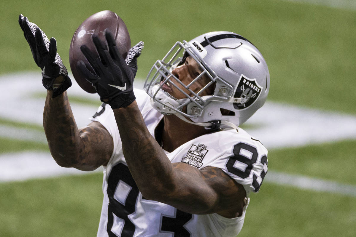 Las Vegas Raiders tight end Darren Waller (83) warms up before the start of an NFL football gam ...