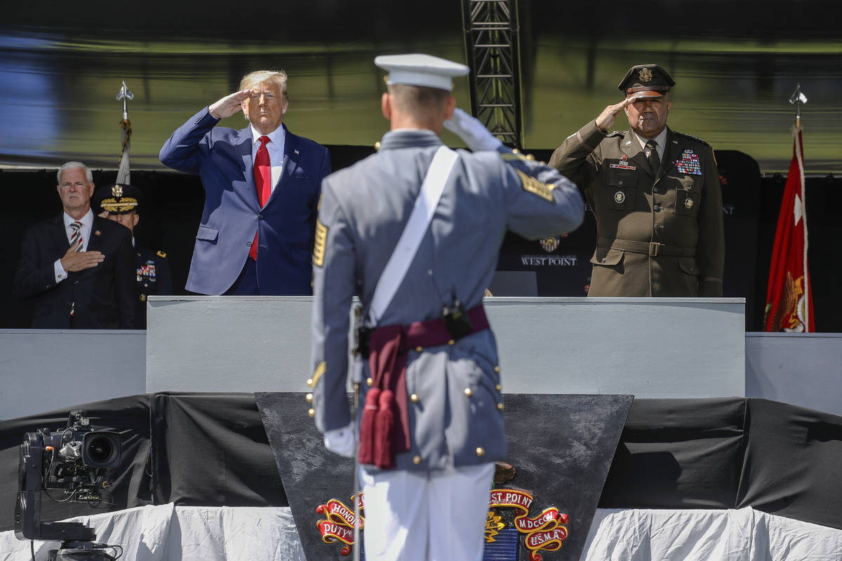 FILE - In this June 13, 2020 photo, President Donald Trump, left, and the United States Militar ...