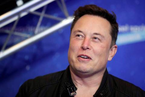 FILE - In this Dec. 1, 2020, file photo, SpaceX owner and Tesla CEO Elon Musk arrives on the re ...
