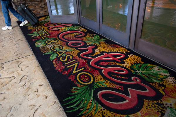 A guest exits the El Cortez, which recently replaced its iconic carpet with this new one in Sep ...