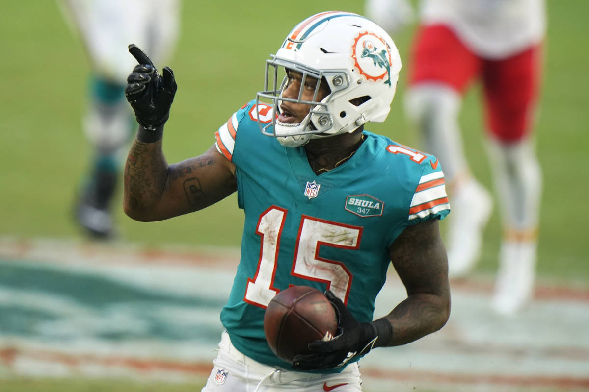 Miami Dolphins running back Lynn Bowden (15) gestures during the second half of an NFL football ...