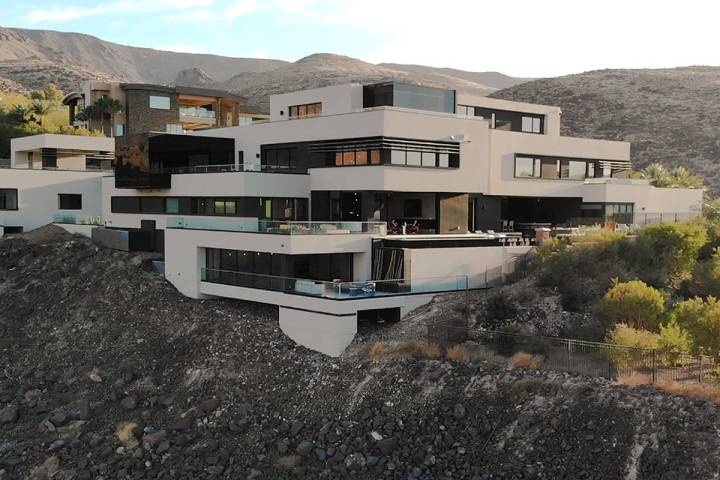 This 14,486-square-foot mansion in MacDonald Highlands in Henderson has sold for $11,250,001. T ...