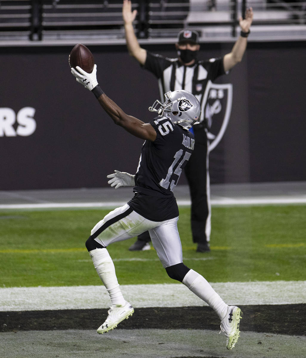 Raiders wide receiver Nelson Agholor (15) celebrates his touchdown during the fourth quarter of ...