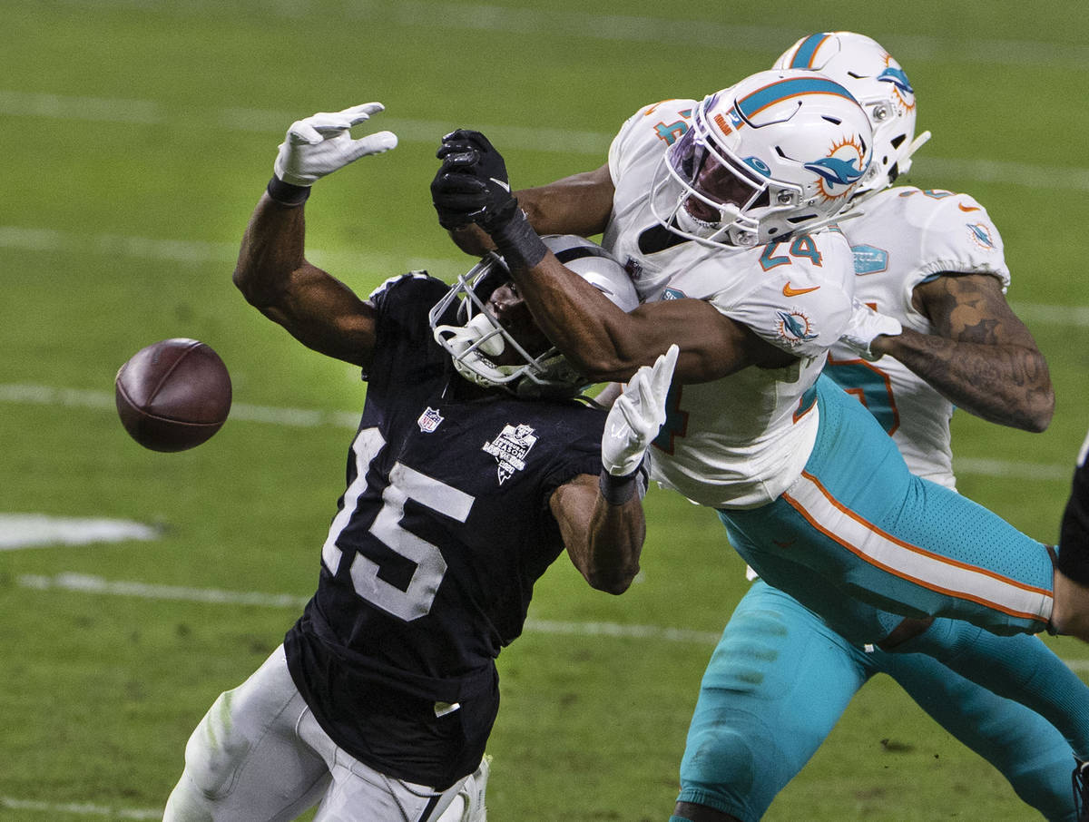Miami Dolphins cornerback Byron Jones (24) deflects the ball intended to Raiders wide receiver ...