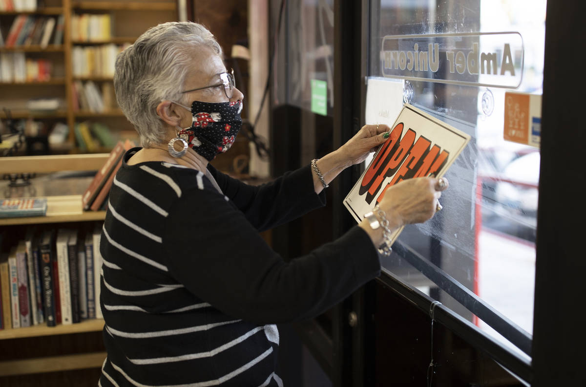 Myrna Donato, owner of Amber Unicorn Books, closes shop on the last business day at the Vegas l ...